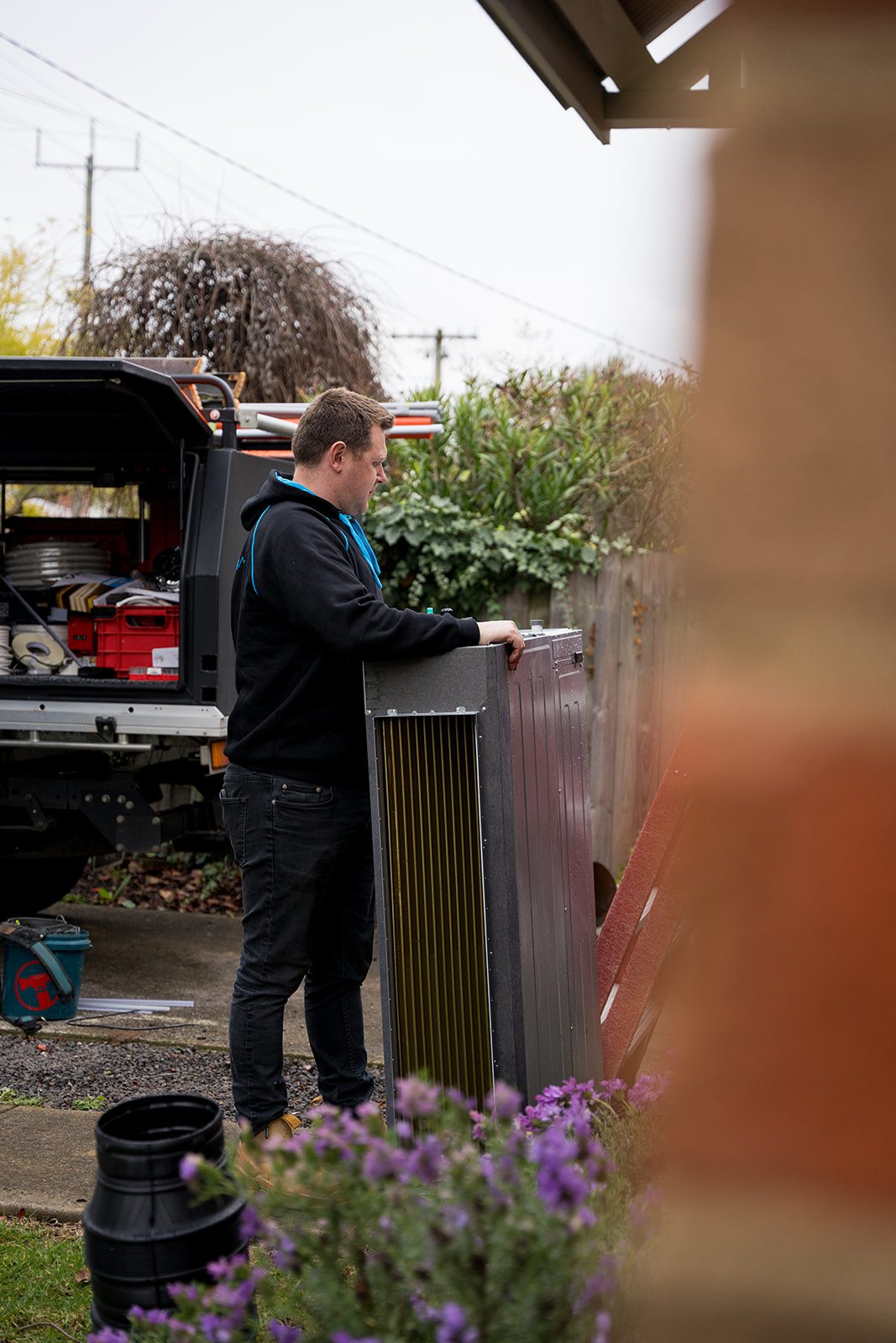 Technician installing a split system
